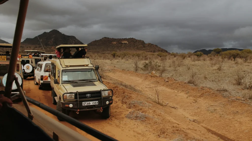 Safari vehicle convoy in Tsavo East, Kenya